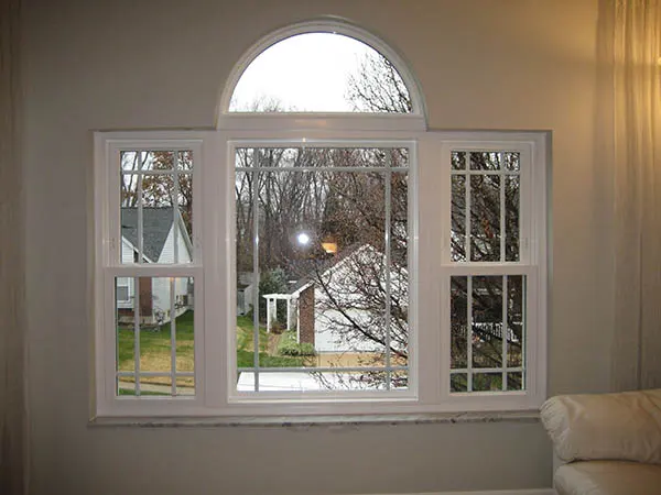 Arched-top window with white trim